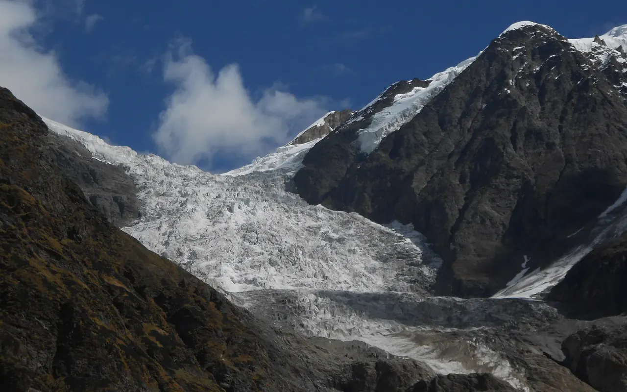 Pindari Glacier descending between rocky Himalayan slopes